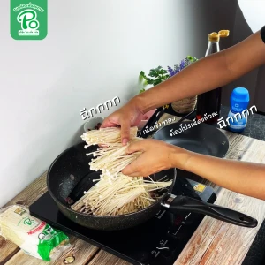 Enoki noodles stir-fried with bacon and dried chili